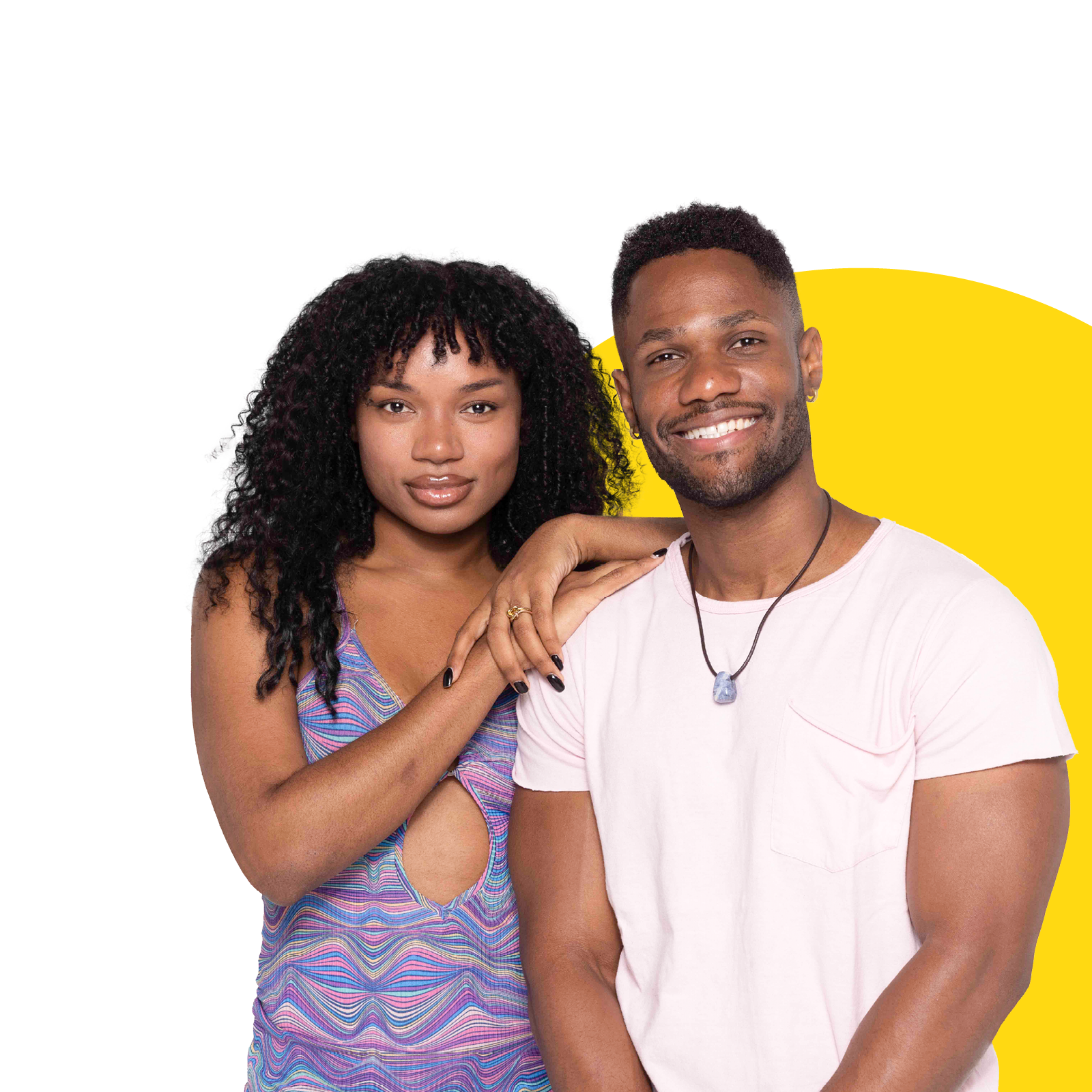 couple in front of yellow background